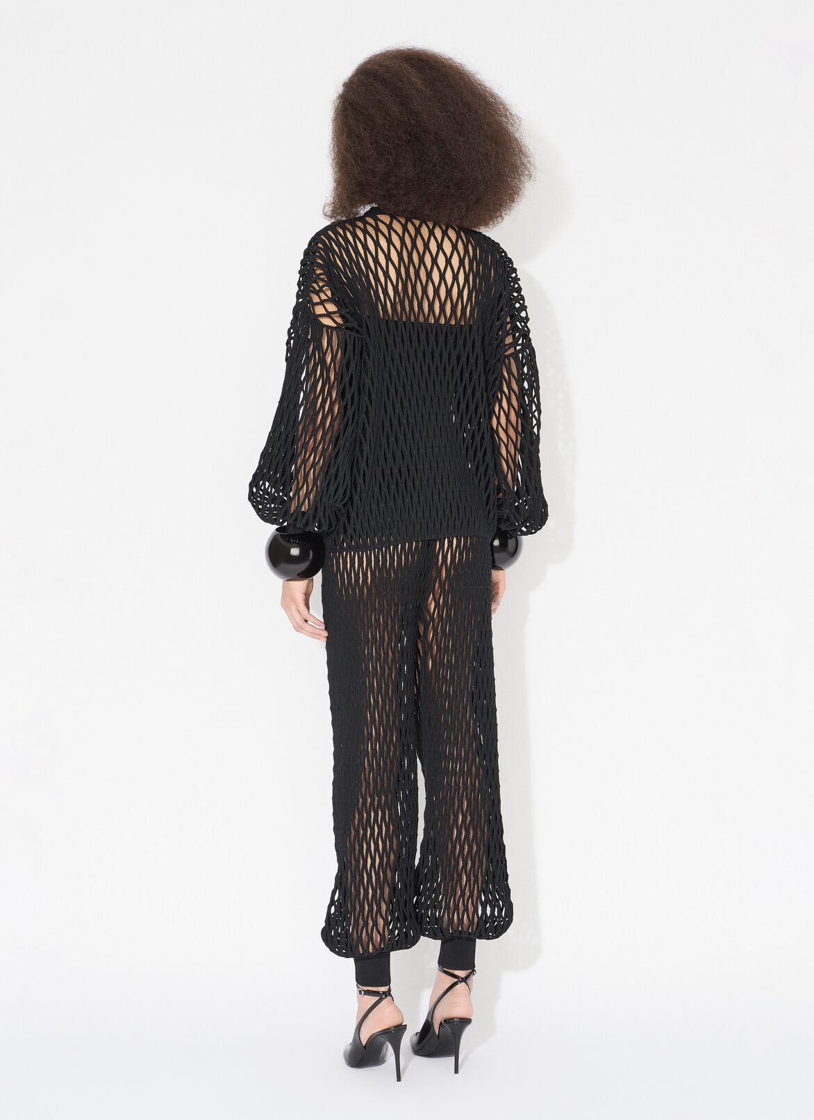MACRAMÉ KNIT PANTS ALAÏA BLACK MACRAMÉ KNIT PANTS